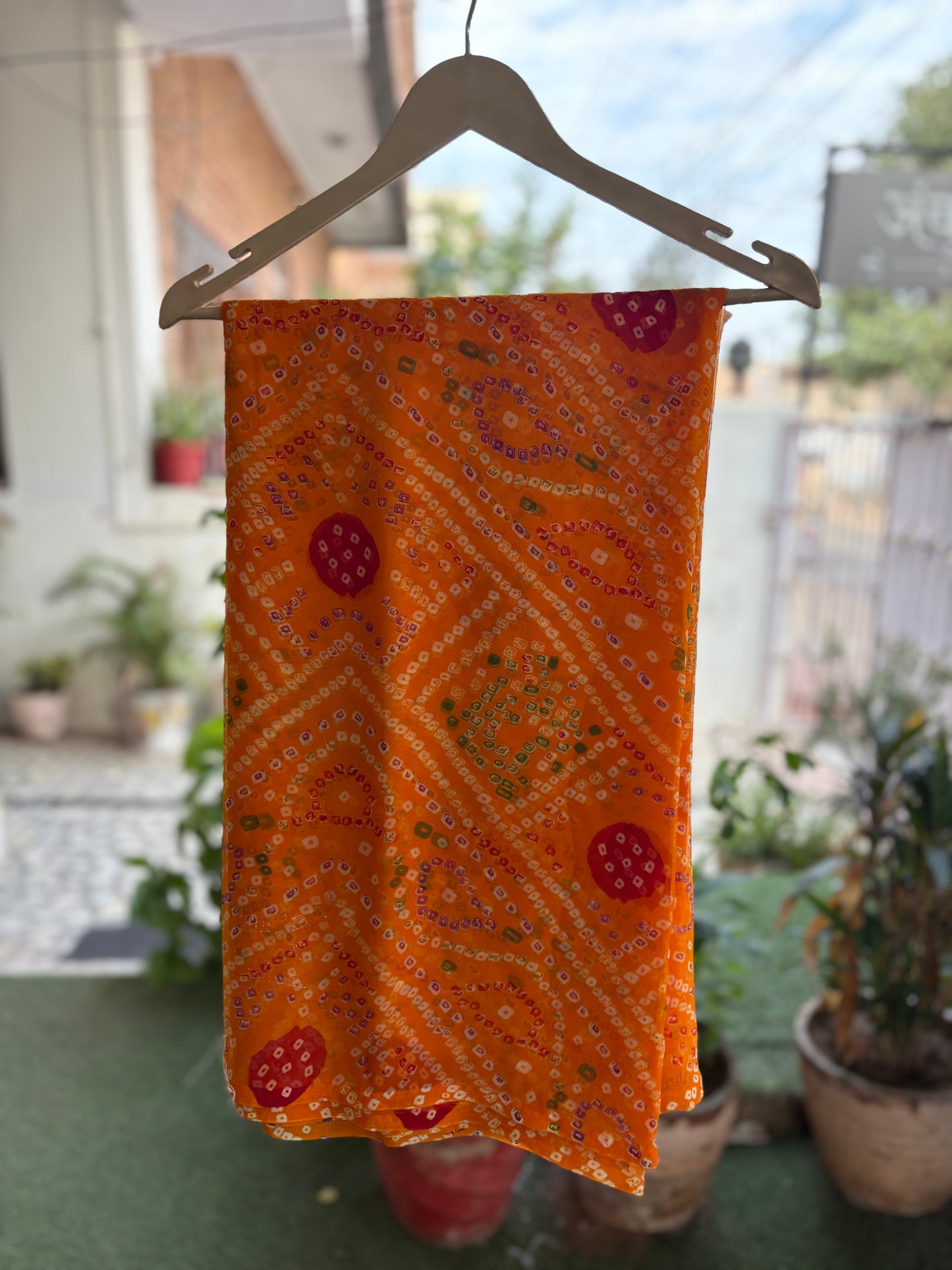 Mango Yellow Bandhani Saree with Ladu