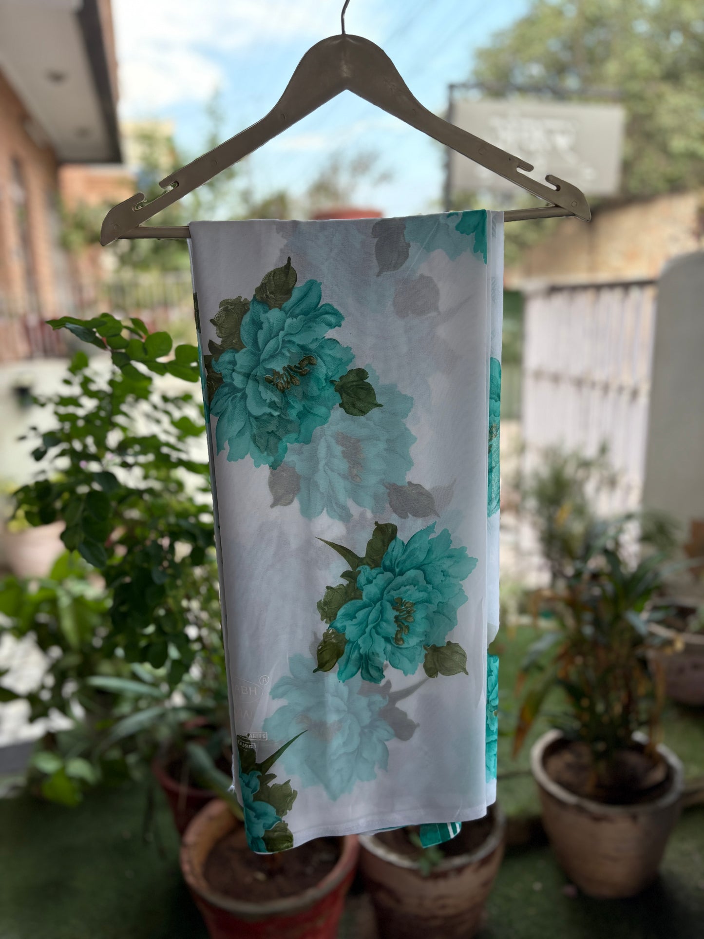 Firozi Flower on White base Latika Saree