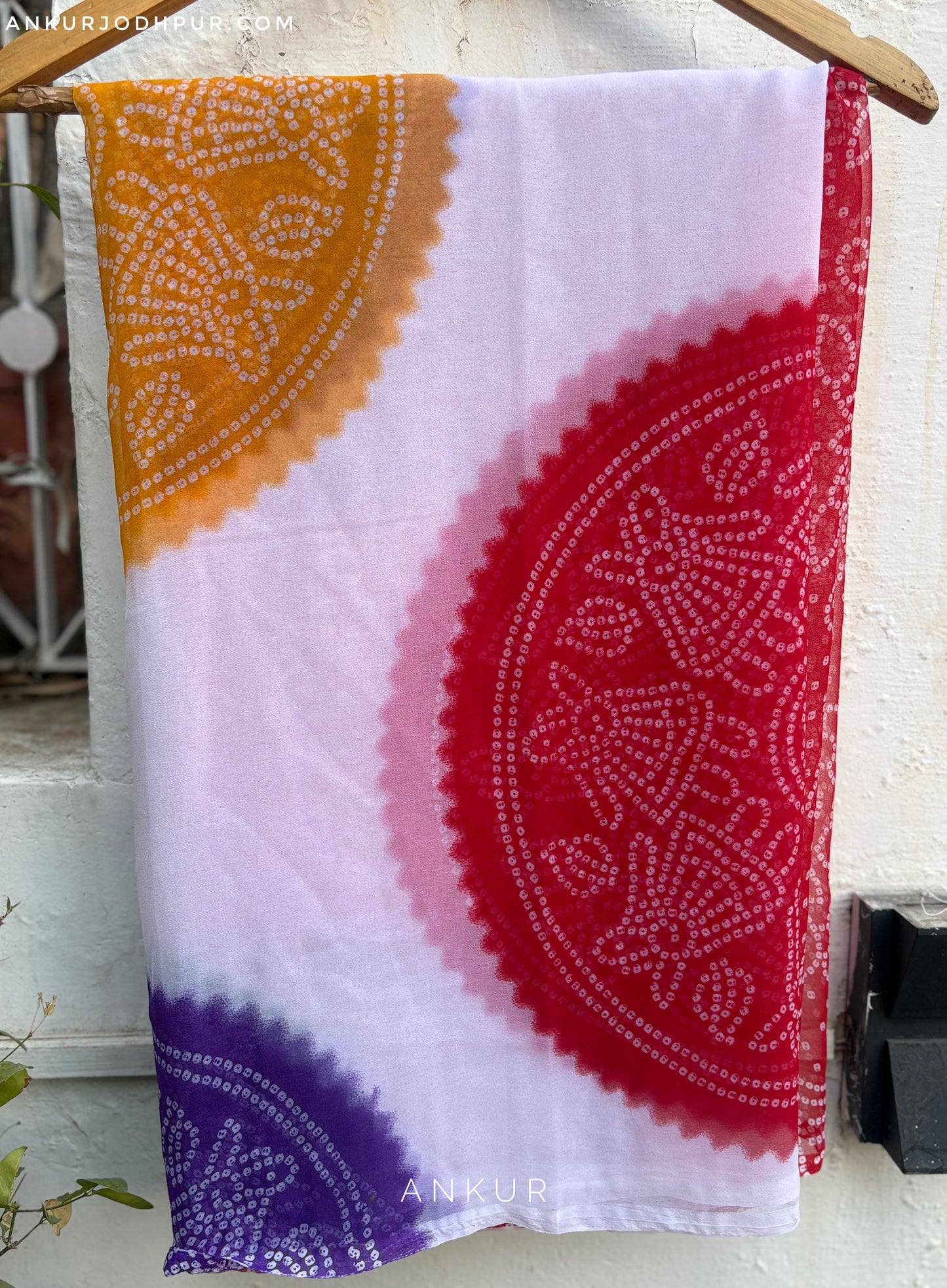 White with multi colour gevar red pallu Faganiya bandhani Saree