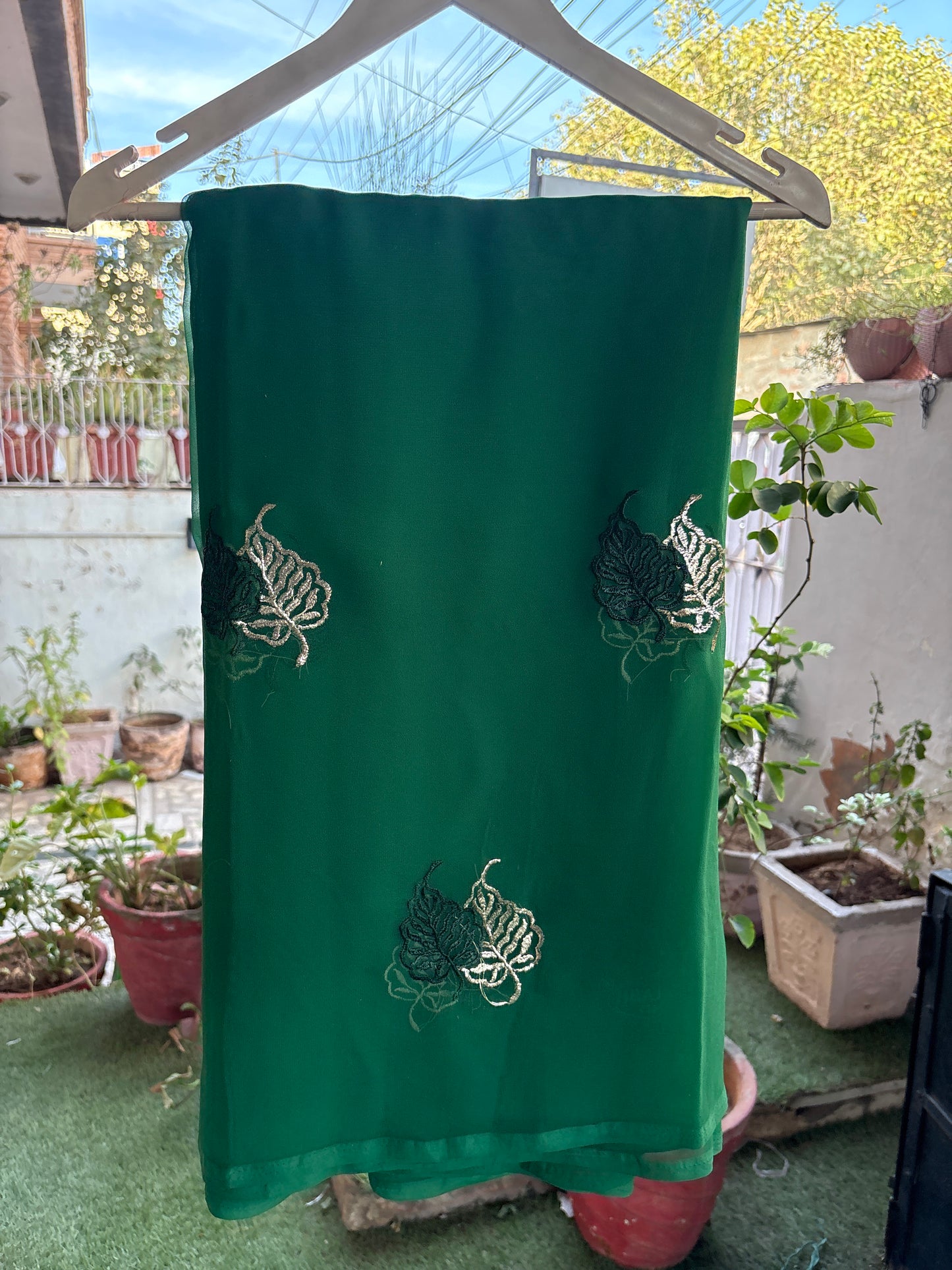 Green double leaf design in thread work Anvi