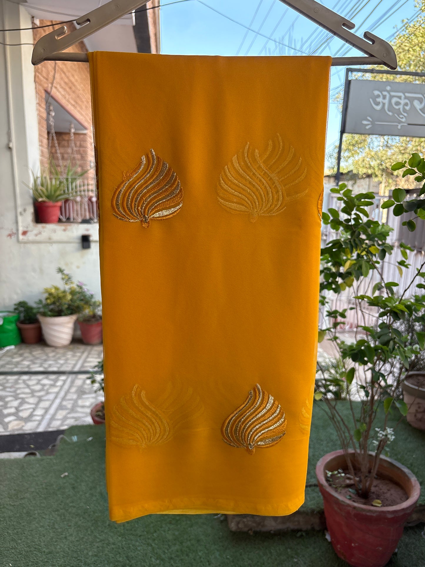 Yellow leaf design in thread work Anvi